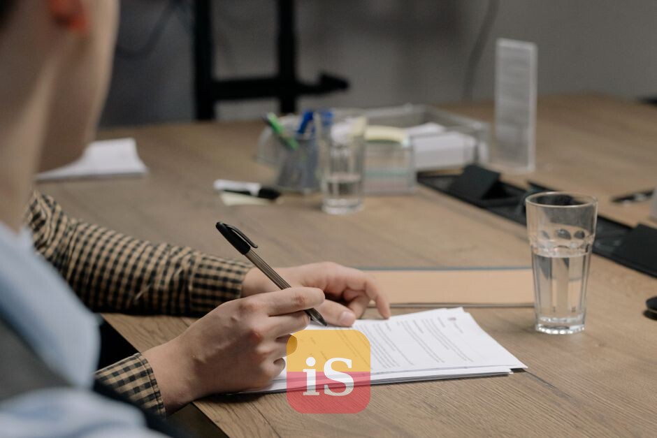 documents signing pen desk