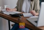 laptop invoice screen desk
